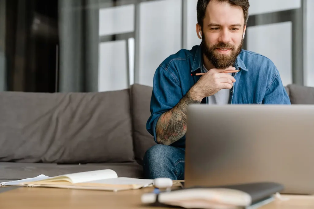 Man behind laptop